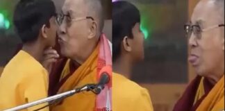 Dalái Lama besa niño